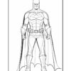 Batman stands confidently, wearing his iconic costume with a cape and cowl, ready for action.