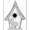 Black and white outline of a decorative birdhouse with a circular entrance hole, and two flowers at the base, featuring detailed patterns on the roof.